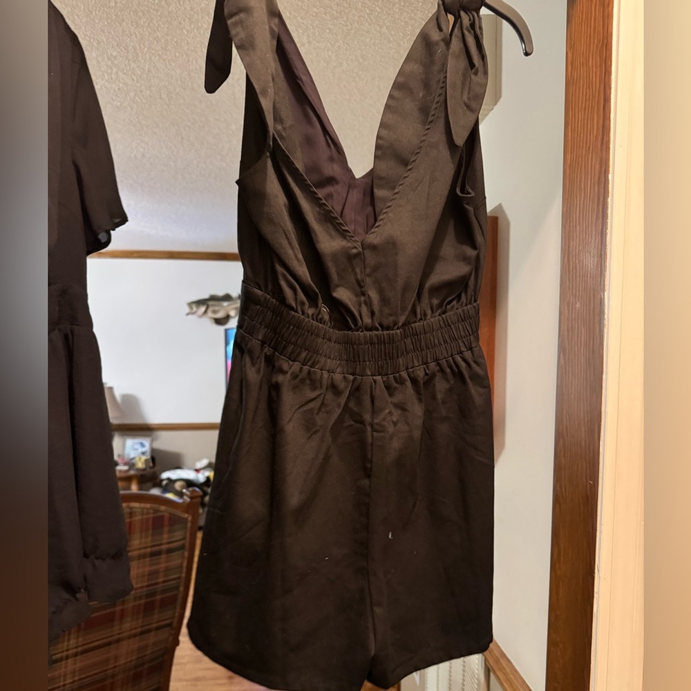 Pink lily size medium black romper